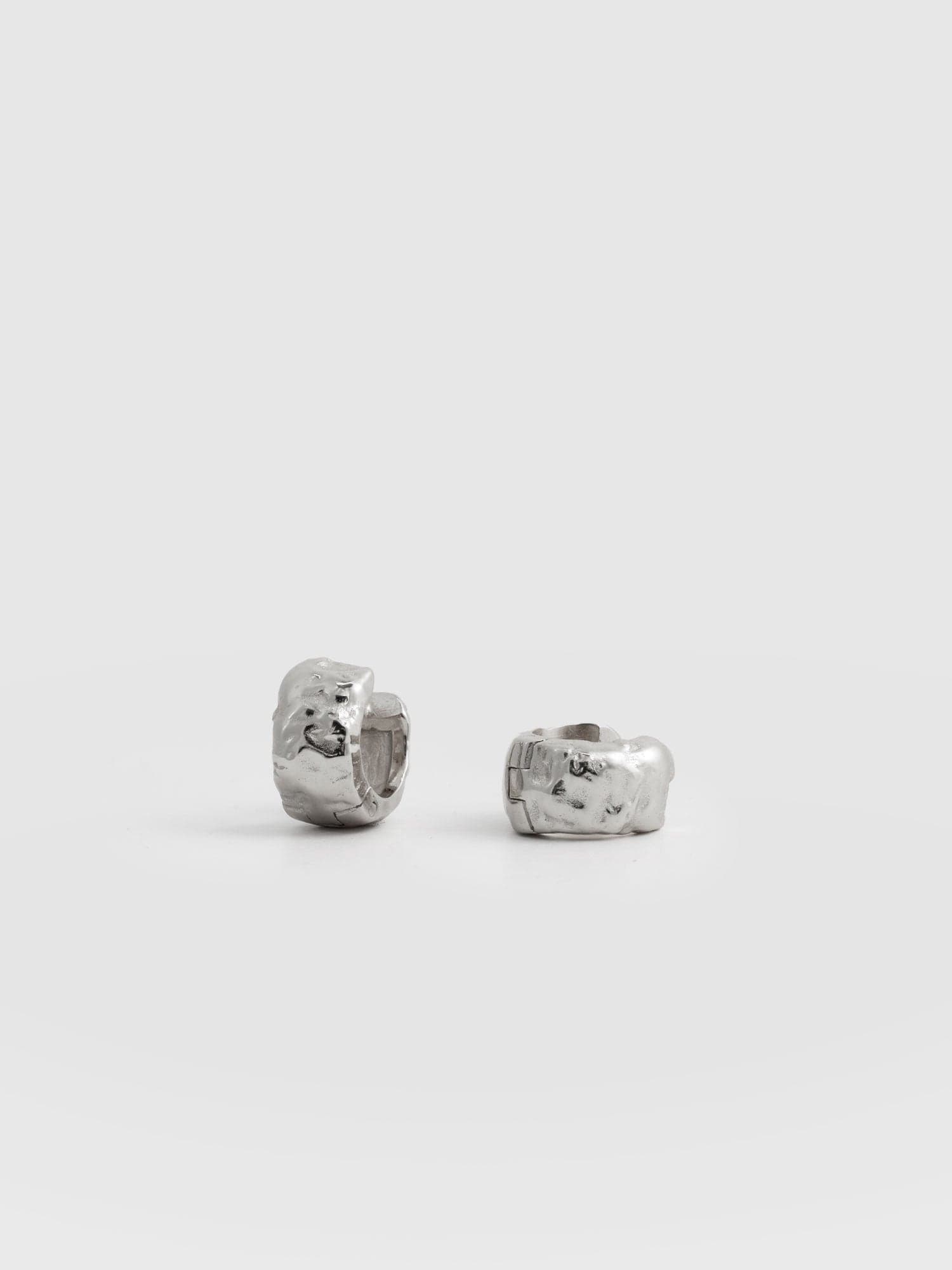 Molten Huggie Earrings - Silver